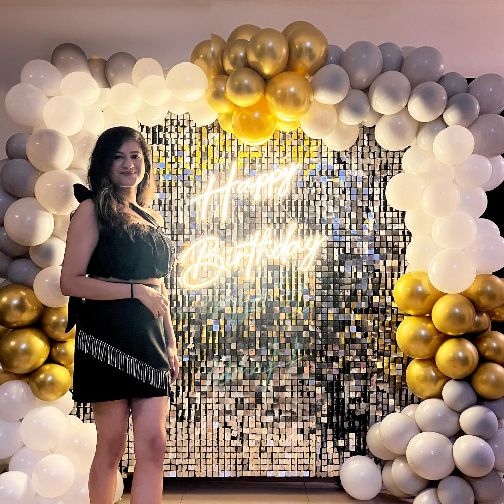 Classic décor with the grey and golden theme and silver sequin backdrop adds sparkle to your event.