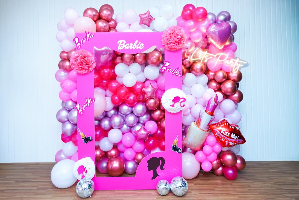Enchanting and Glamorous Barbie theme birthday decor comes with pastel pink, magenta, and white balloons.