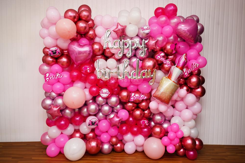 An elegant Barbie theme birthday decor backdrop comes with a silver Happy Birthday Balloon!