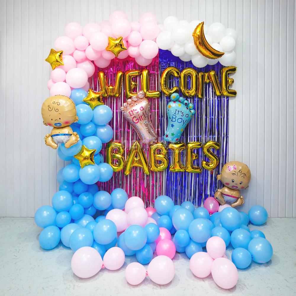 Experience the Delightful Vibe with a balloon backdrop and foil balloons.