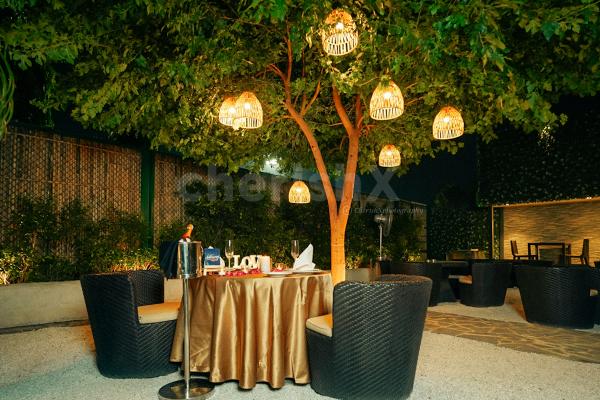 Ignite the Flames of Romance with our Captivating Decor and Enchanting Ambience.
