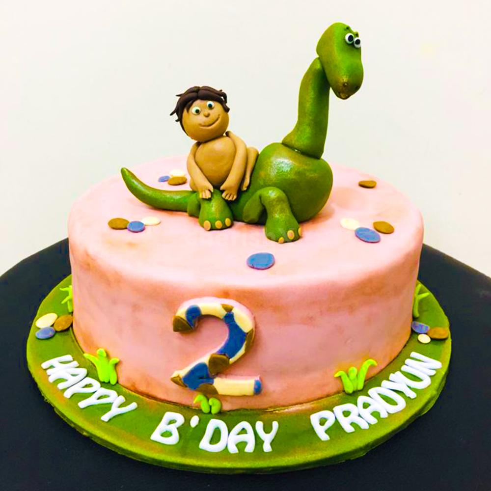 Our Dinosaur Fondant Cake brings The Good Dinosaur theme to life, capturing the hearts of young adventurers.