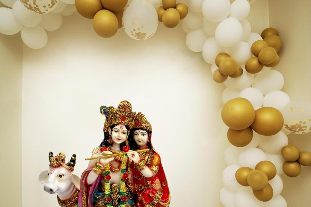 Introducing the divine aura of White and Gold backdrop decoration for Krishna Janmashtami