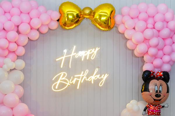 white latex, pink latex, and golden chrome balloons give a truly stunning visual display that forms the perfect backdrop for your celebration.