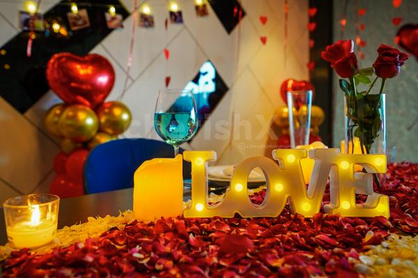 Share smiles, laughter, and stolen glances in a love-filled environment all adorned with rose petals and LED candles.