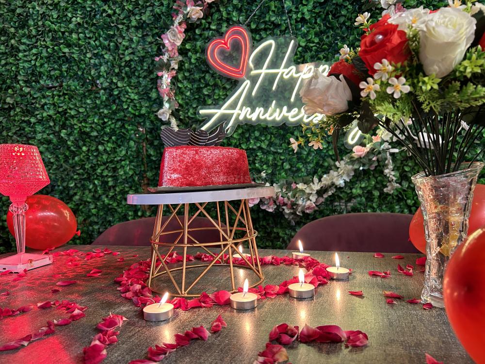 Get a Personalized Neon-Lit Backdrop and Welcome Drinks.