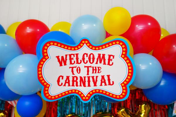 Let the Birthday Shine with a Happy Birthday Foil Balloon Amidst Carnival Magic.