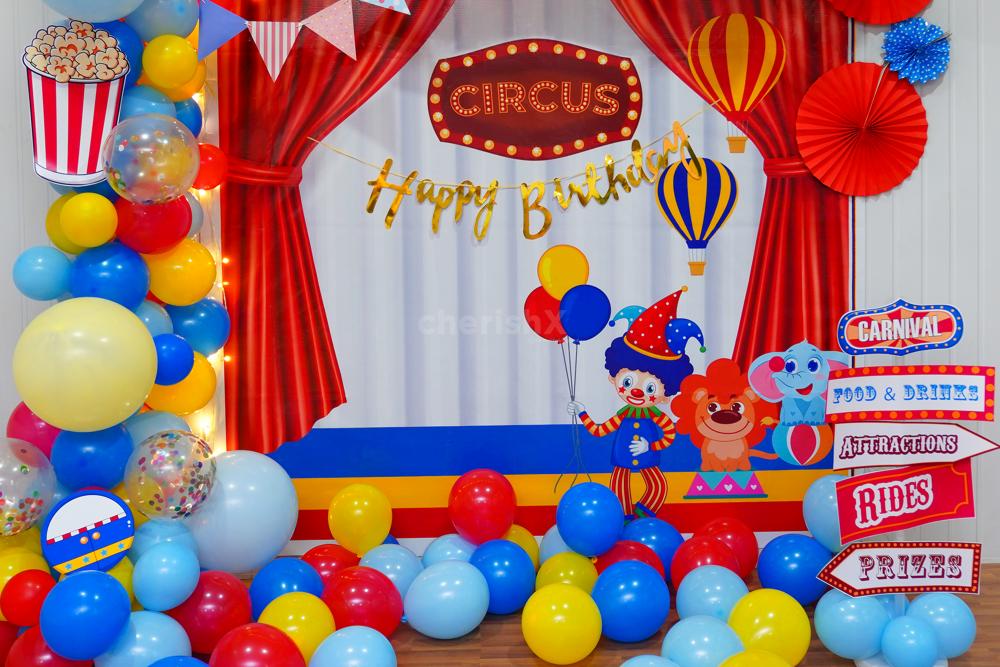 Circus Magic in the Air: Immerse in Triangle Bunting and Red & Blue Rosettes.