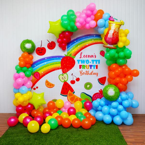 Dive into the Rainbow Fruit Delight Decoration with Multiple Balloons.