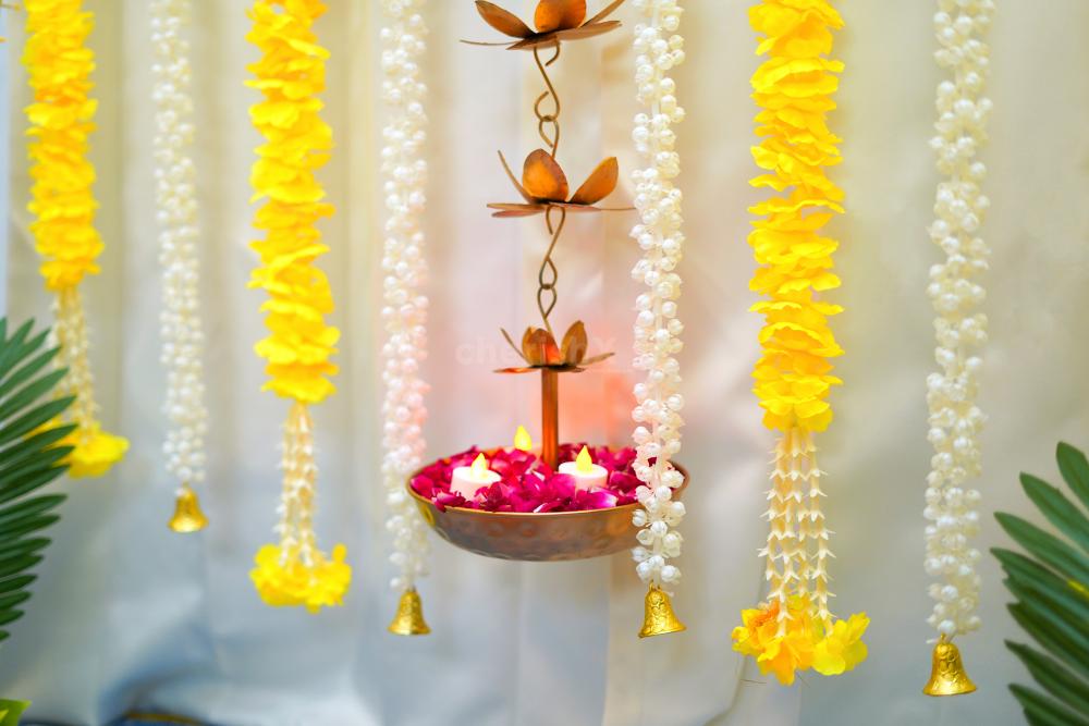 Add your personal touch and incorporate real flower petals, a Diwali puja chowki, elegant candle stands, LED candles, and more.