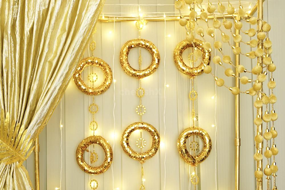Golden Silk Hanging draperies infuse your space with sophistication and charm this Diwali.