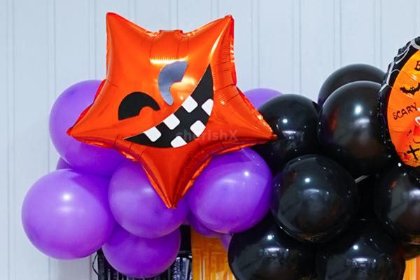 Golden Boo Foil Balloons and Spooky Paper Cutouts Add An Eerie Charm to Your Space.