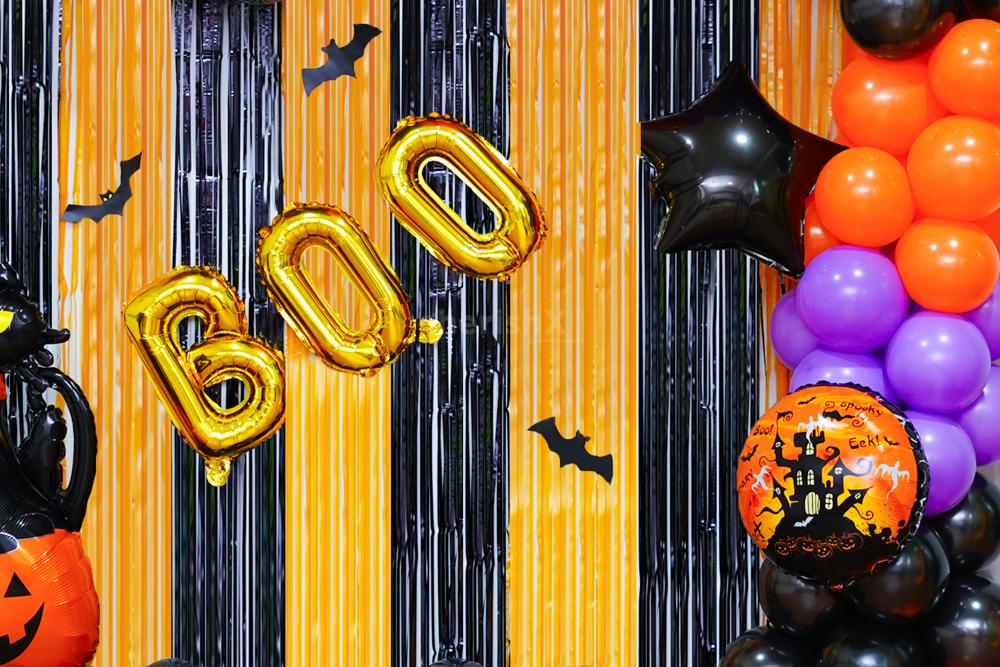 Balloon Arch in the Haunting Colours of Orange, Purple, and Black, Creates the Perfect Eerie Backdrop