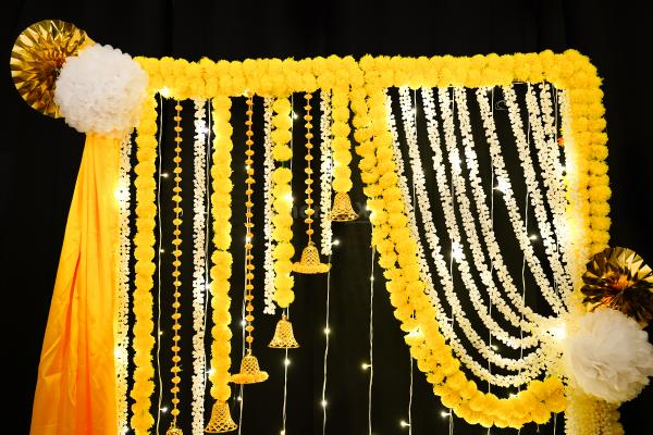 Elevate your Diwali or Navratri décor with our Garland-themed backdrop, a versatile beauty that adapts to any celebration.