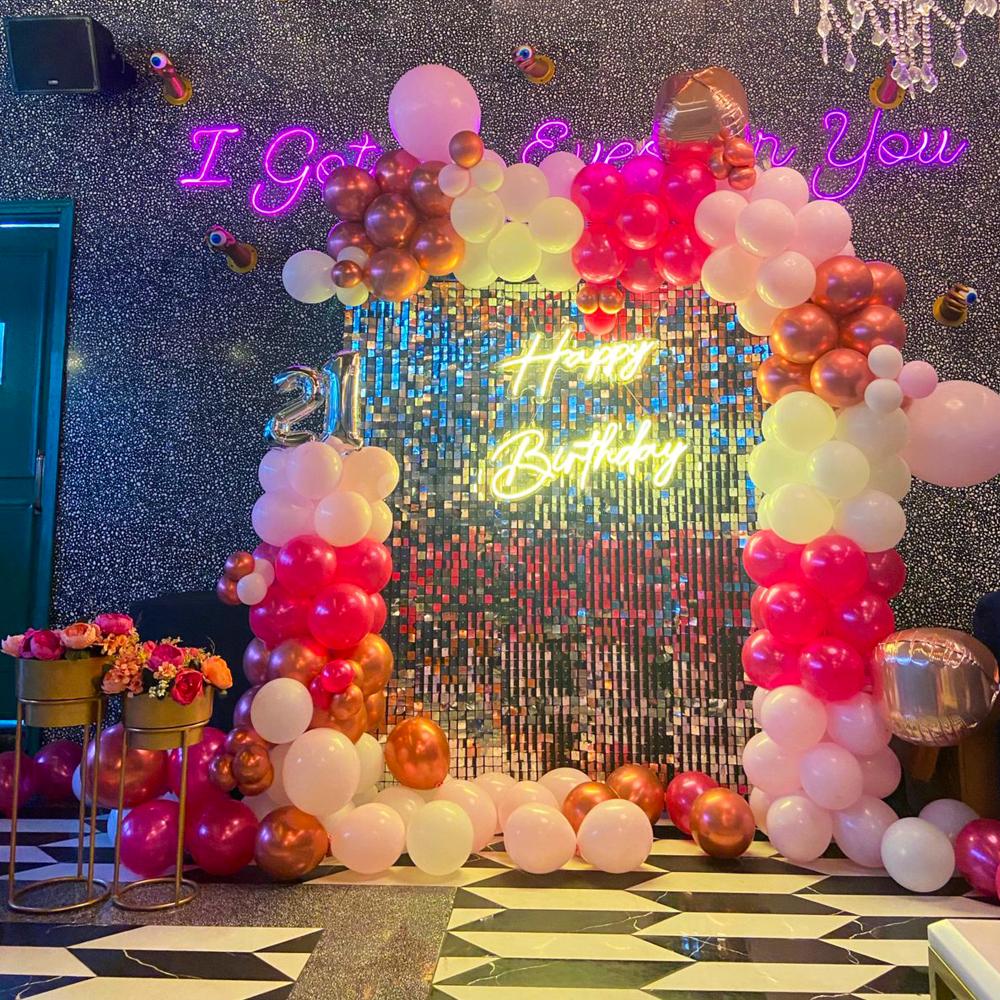 An unforgettable birthday soirée featuring classy silver accents and charming pink hues.