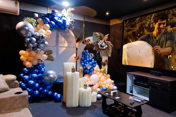 Immerse yourself in the cosy ambience of our Private Show Movie with your partner amidst beautiful decorations
