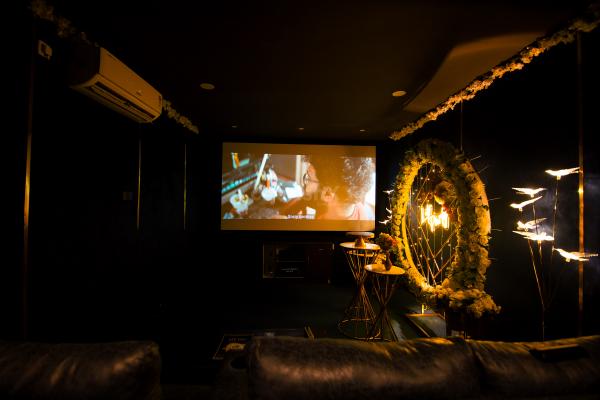 Experience the joy of family bonding with CherishX's exclusive movie night decorations and comfortable seating.