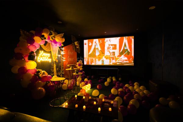 Enchanting cake table adorned for the special cake-cutting moments during the private movie night.