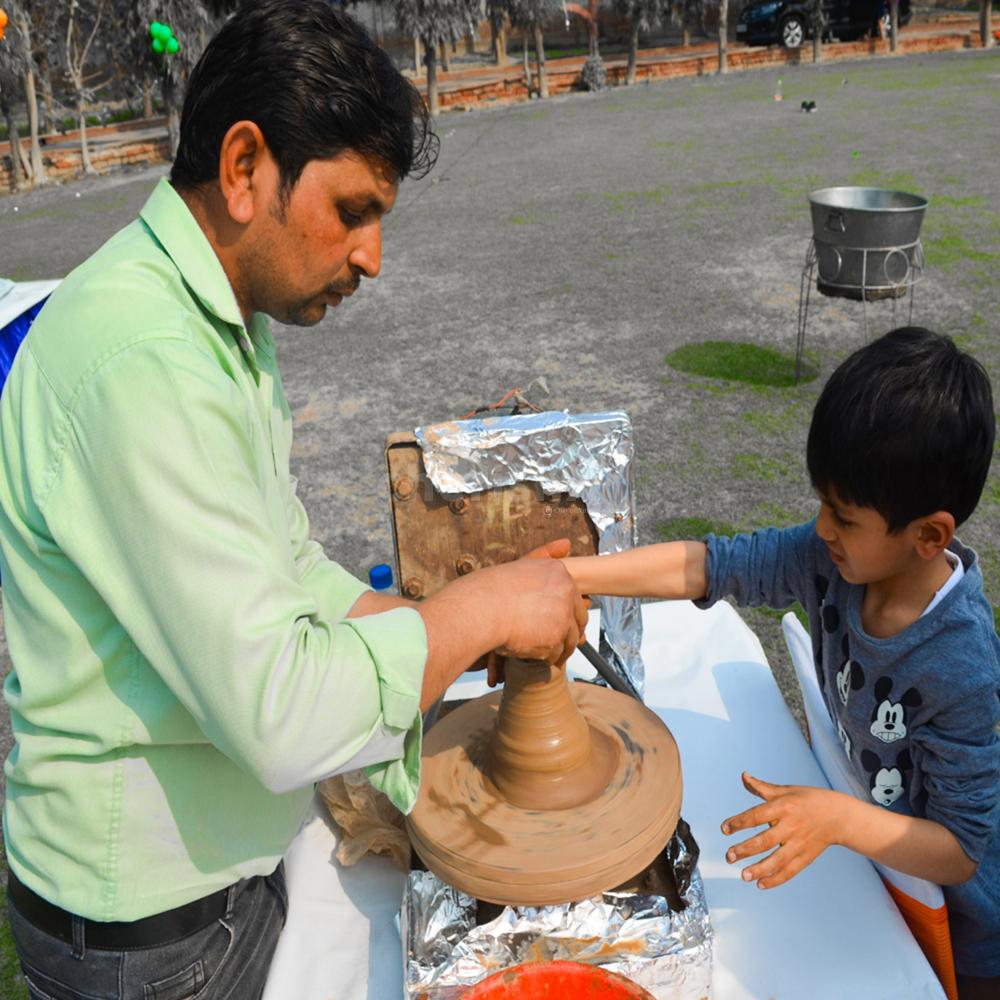 The pottery artist will make little clay models and create different shapes.