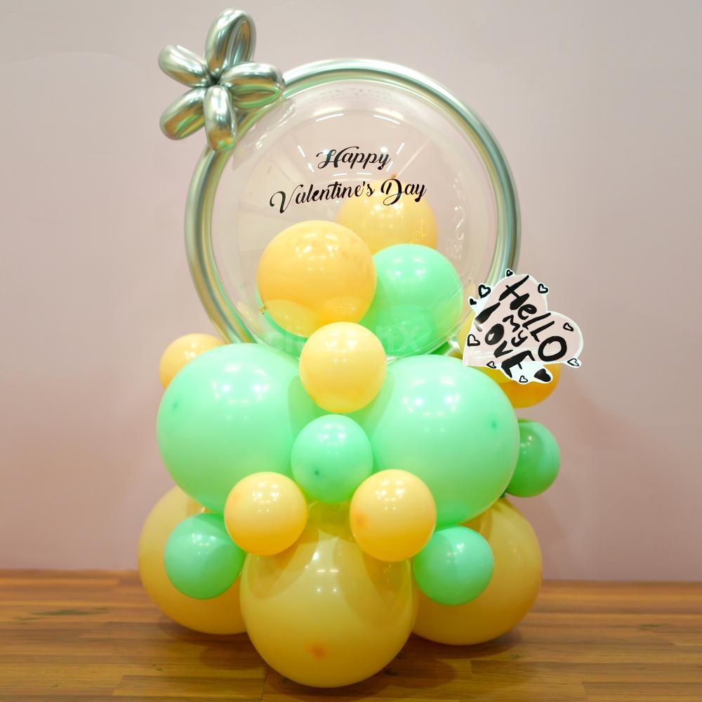 This special balloon bouquet boasts a Bubble Balloon with a Happy Valentine's Day Black Vinyl