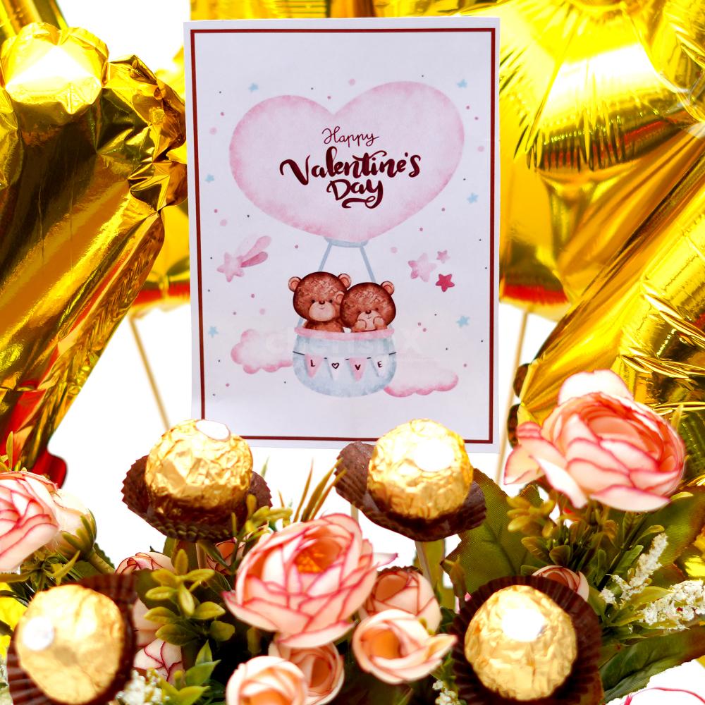 The bucket also consists of Ferrero Rocher chocolates with artificial flowers