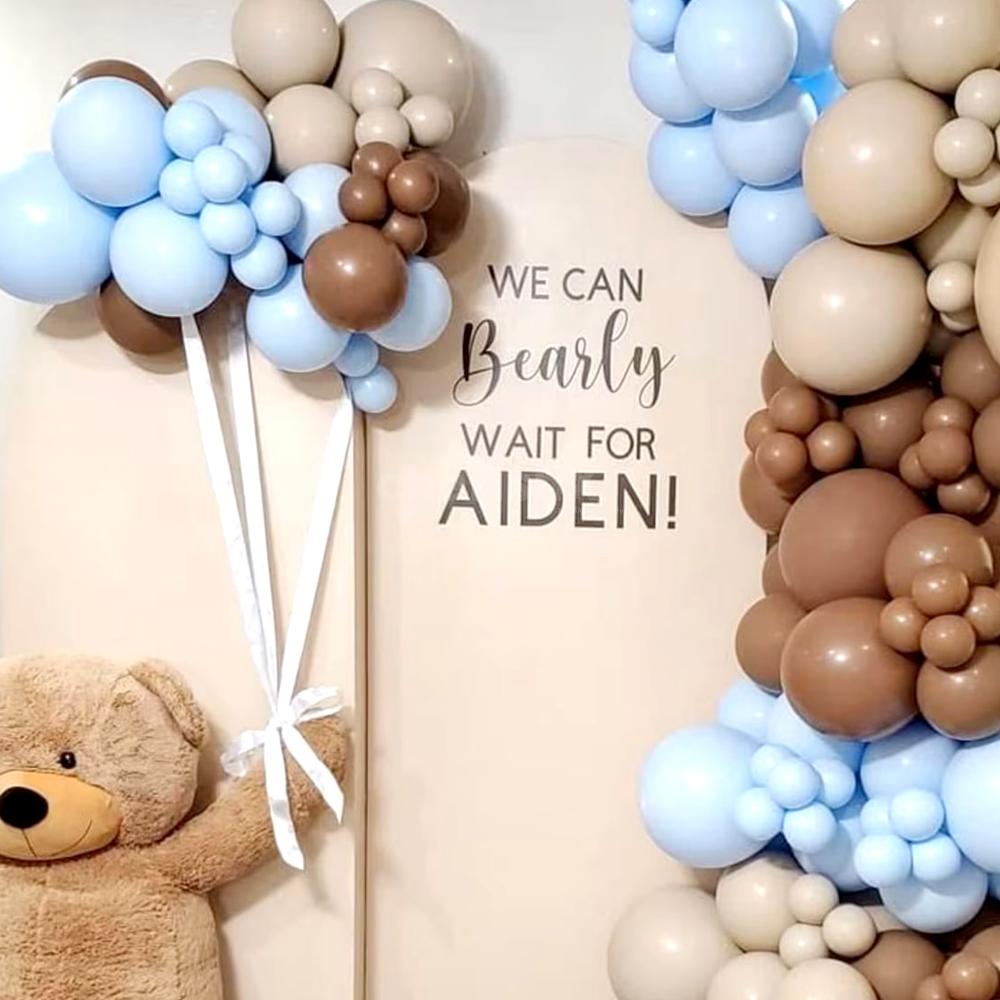 Blue and brown baby shower balloon garland arch near me