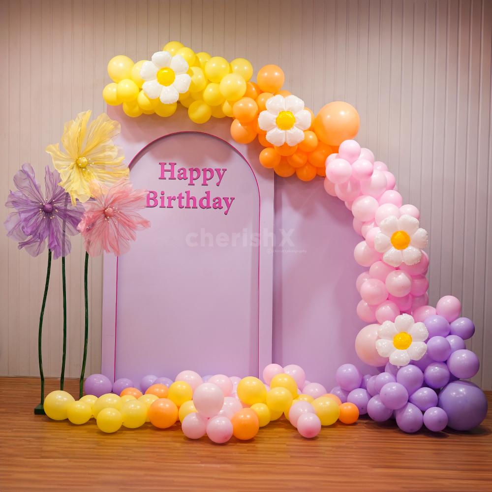 Balloons and blooms collide in a celebration of color and joy