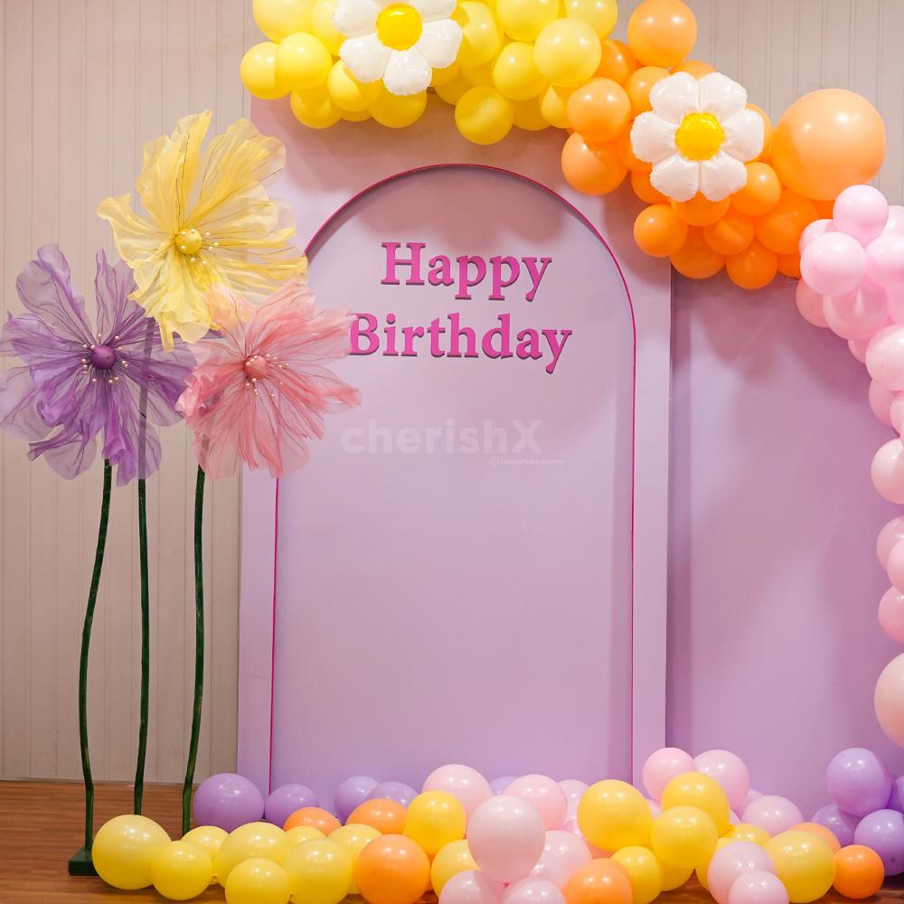 Let the magic of balloons and flowers elevate your birthday bash