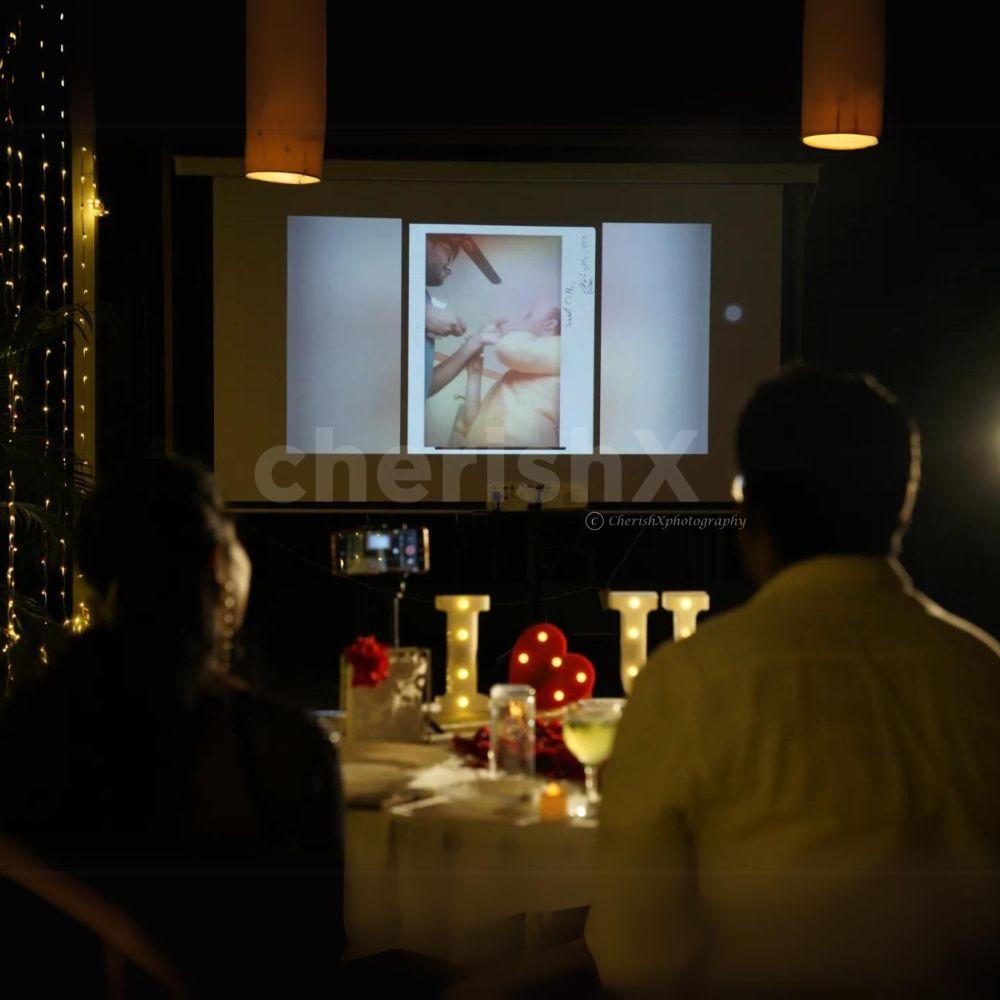 The setup also comes with a beautifully decorated table with rose petals and "I Love You" led letters.